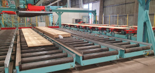 9.	Roll Conveyor for 4 packages with shuttle and vacuum destacking