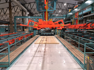 14.	Vacuum stacking machine for preparation of packages before pressing