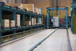 Package shuttle and day storage for timber packages